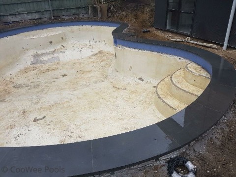 hand cut and shaped bluestone coping
